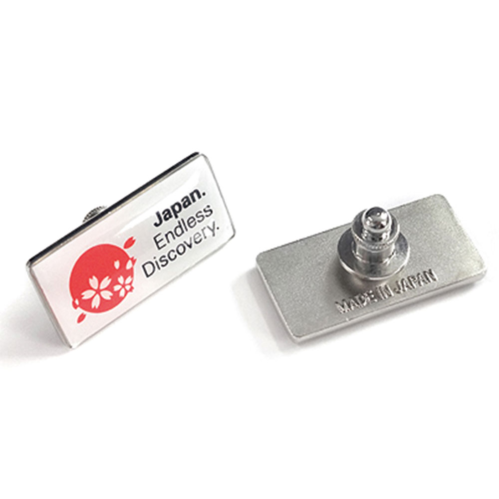 訪日外国人への配布用として「Japan.Endless Discovery」ピンバッチ